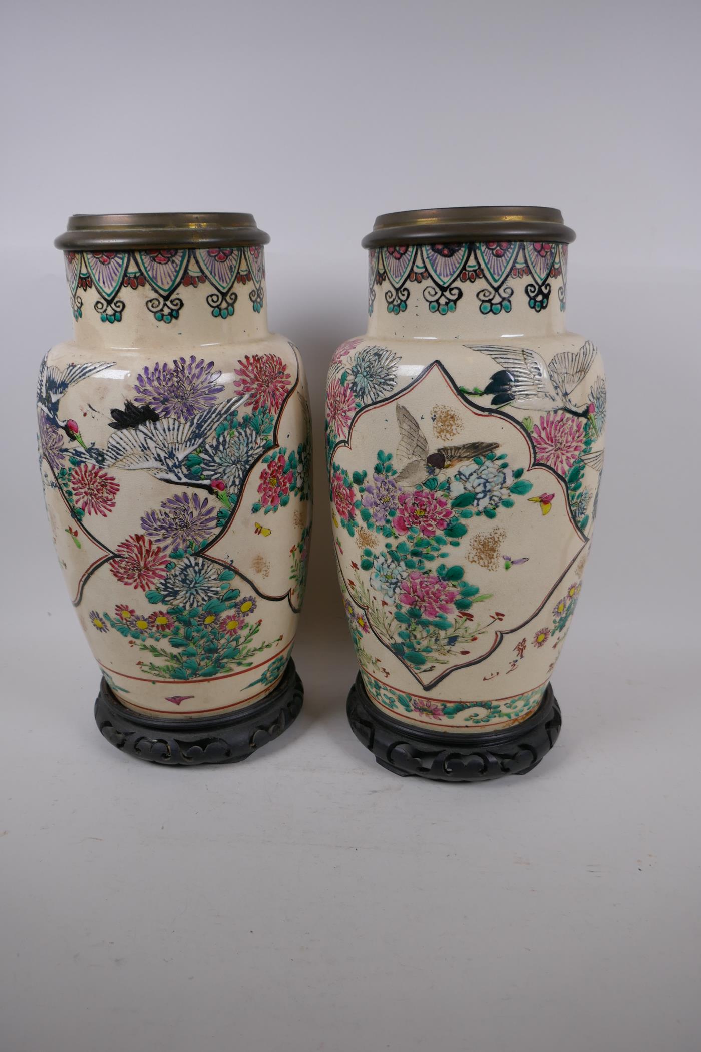 A pair of Japanese Satsuma pottery oil lamp base vases, painted with birds and flowers on carved - Image 2 of 2