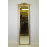 A C19th giltwood and composition wall mirror, with crested top and laurel leaf moulding, 196 x 59cm