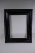 A C19th Dutch ebonised ripple frame, 47 x 36cm