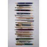 A collection of assorted propelling pencils including Cross, The Aladdin, Conway Stewart, Papermate,