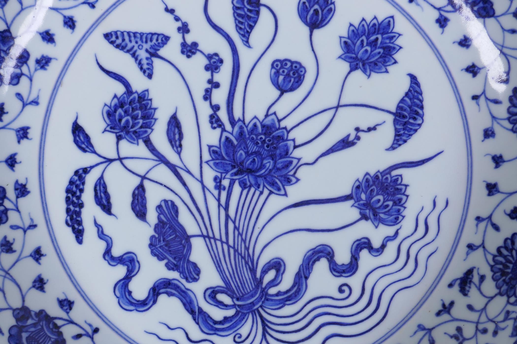 A blue and white porcelain charger with lotus flower decoration, Chinese Xuande 6 character mark - Image 2 of 5