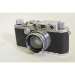 A vintage Leica, DRP Ernst Leitz Wetzlar 35mm camera, with Summitar f-5cm lens 1:2 No 509347, the