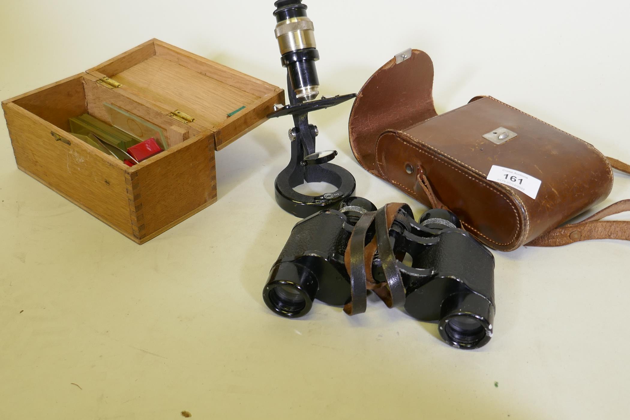 A Carl Zeiss Jena pair of binoculars, 6x24 lens, with leather case, and a Baker of London