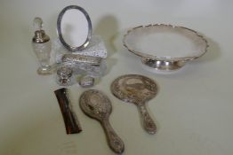 A collection of silver items, photo frame, scent bottle with silver mount pill box, trinket boxes