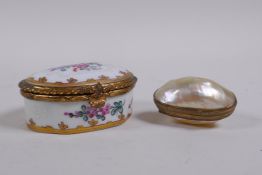 A C19th Chinese export ware porcelain pill/snuff box, with gilt metal mounts and floral