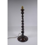 A mahogany barley twist lamp, 56cm high