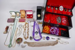 A quantity of good quality vintage costume jewellery including some silver pieces