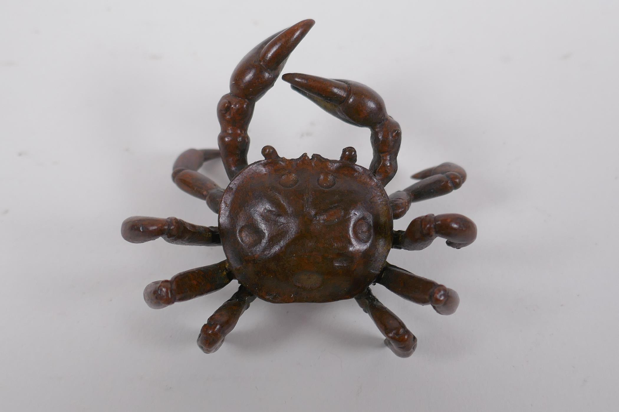 A Japanese bronze okimono crab, 6cm wide