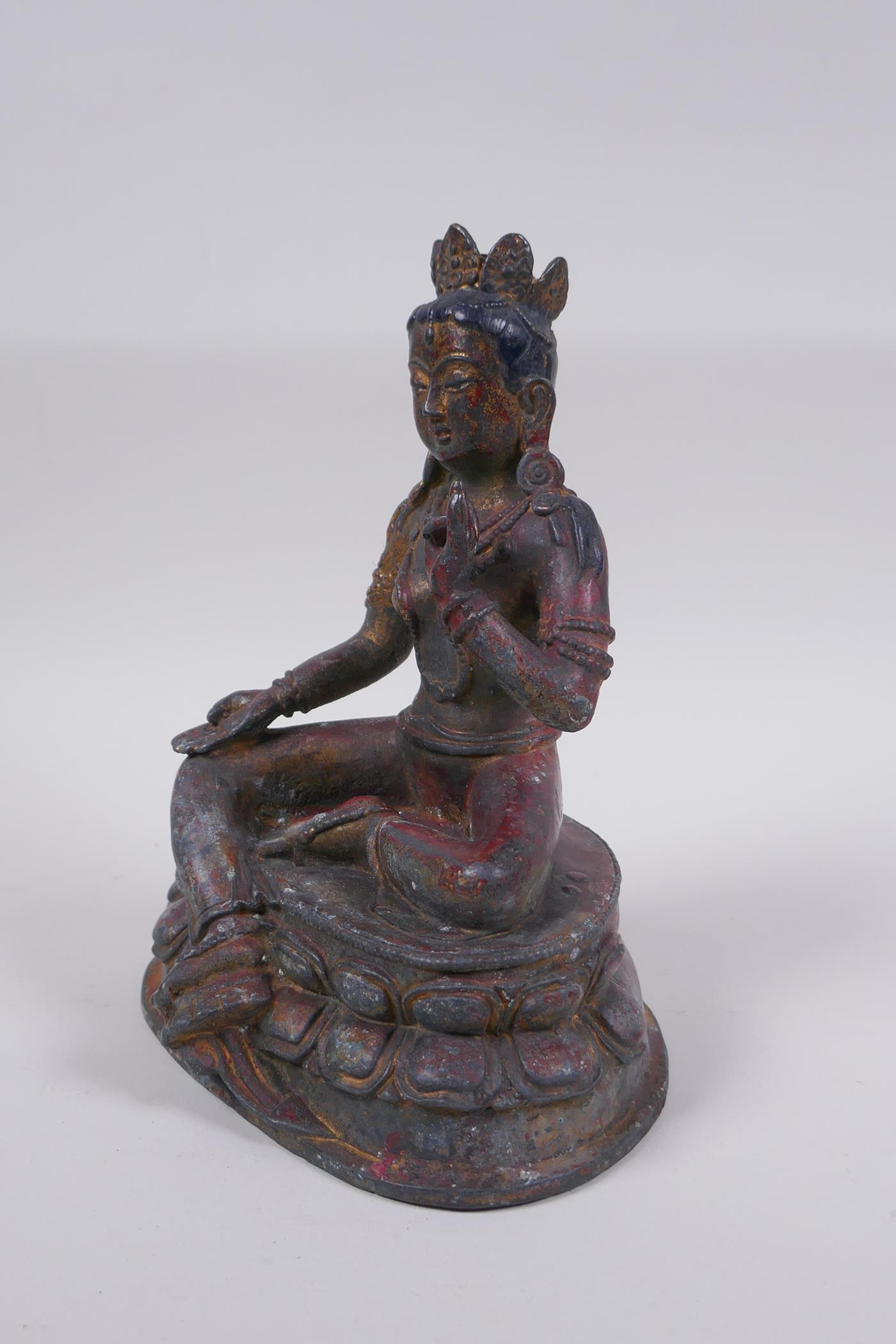 A Sino Tibetan bronze figure of a female deity with the remnants of gilt patina, 20cm high - Image 4 of 6