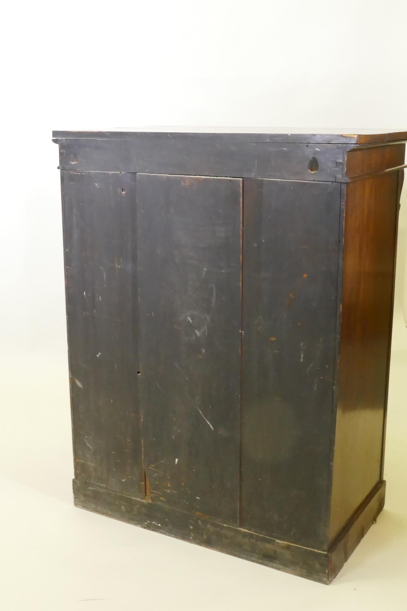 A C19th rosewood Wellington chest of six drawers, raised on a plinth base, 77 x 46 x 101cm - Image 8 of 8