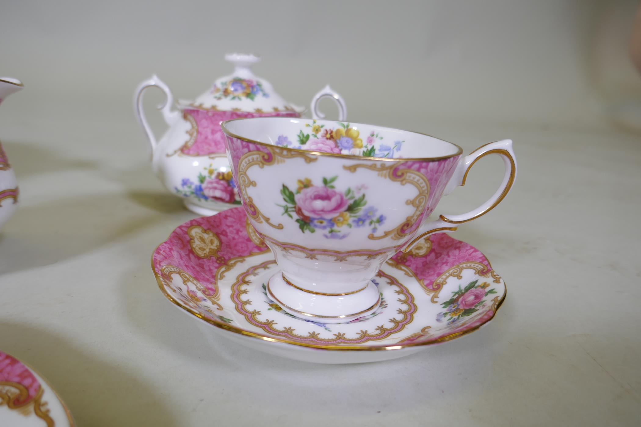 A Royal Albert Lady Carlyle six place dinner and tea service, including tea cups and saucers, cake - Image 5 of 7