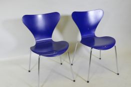 A pair of Danish Fritz Hansen chairs after Arne Jacobsen, blue painted wood seats and chrome