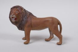 An Austrian style cold painted bronze lion in the manner of Bergman, 9cm long