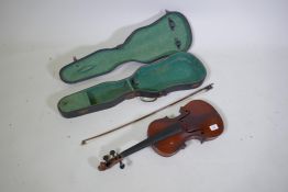 An antique violin, bears label Giovanni Paolo Grancinero 'Special Orchestra Violin' fabricante