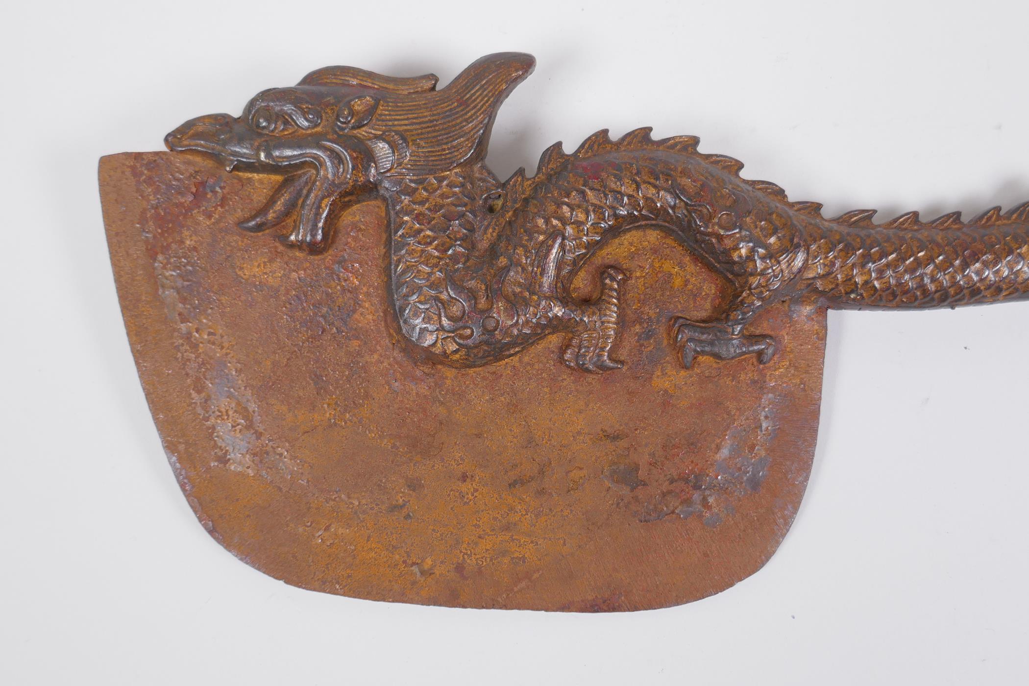 A Sino Tibetan bronze handled ceremonial chopper, the handle in the form of a dragon with the - Image 2 of 3