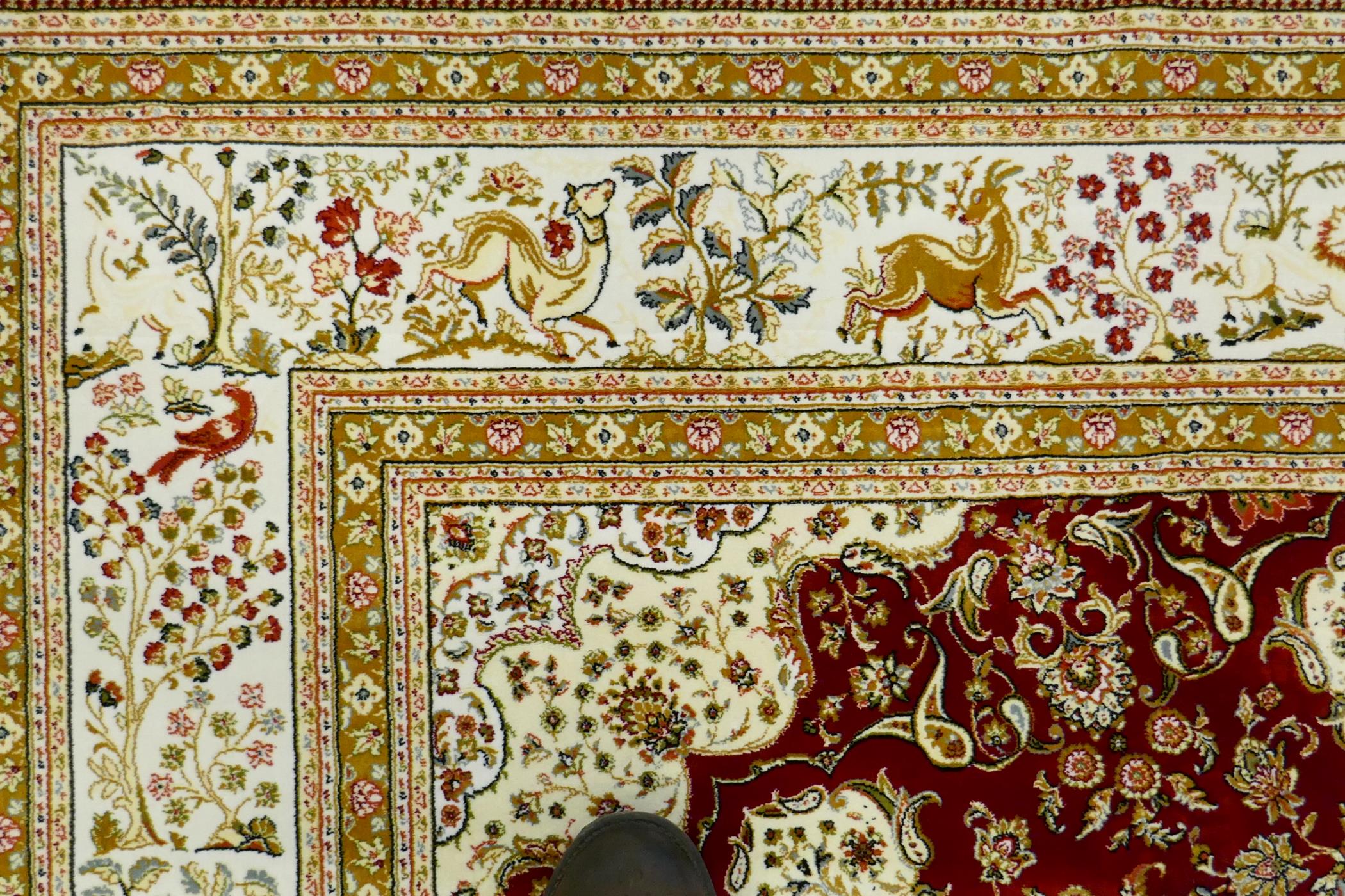 A Persian red ground full pile bamboo silk carpet with central floral medallion design and cream - Image 4 of 9