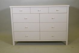 A contemporary white lacquer chest of three over six drawers, possibly Habitat, AF some paint