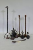 Wrought metal pricket candlestick, 80cm high, a pair of turned wood candlesticks stamped W.T.