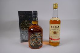 A bottle of 12 year old Chivas Regal Premium Scotch Whisky, 1 litre, and a bottle of Bell's Old