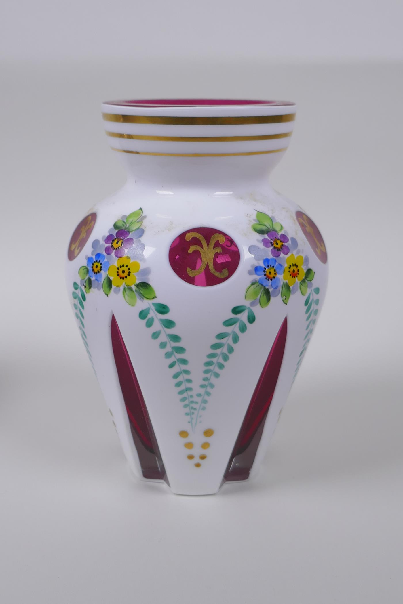 A Bohemian style overlaid ruby glass vase with hand painted floral decoration, and a similar pot and - Image 4 of 8
