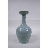 A Chinese celadon crackle glazed porcelain vase with ribbed neck, 23cm high