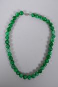 An apple jade bead necklace, 45cm long