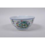 A doucai porcelain rice bowl with dragon decoration, Chinese YongZheng 6 character mark to base,