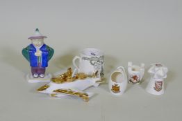 A Royal Doulton Victory & Peace 1919 mug, three pieces of W.H. Goss, a Limoges porcelain cruet, 19cm