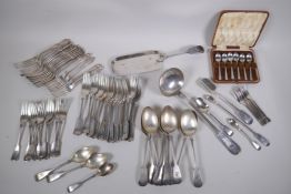 A quantity of silver plated flatware including stilton scoops, ladles, crumb trays etc