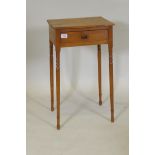 A late C18th/early C19th pine single drawer side table, raised on ring turned and splay tapering