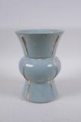 A Chinese Ru-ware style porcelain gu shaped vase, 2 character mark to base, 17cm high