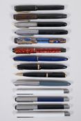 A collection of fountain pens, to include a Mentmore Supreme, a Mentmore Auto-flow, a Mentmore 46, a