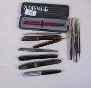 A quantity of pens, a Cross fountain pen and matching ball point and propelling pencil, vintage