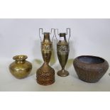 An Indian brass pot with engraved decoration, a copper jardiniere, a pair of brass urns, 33cm high