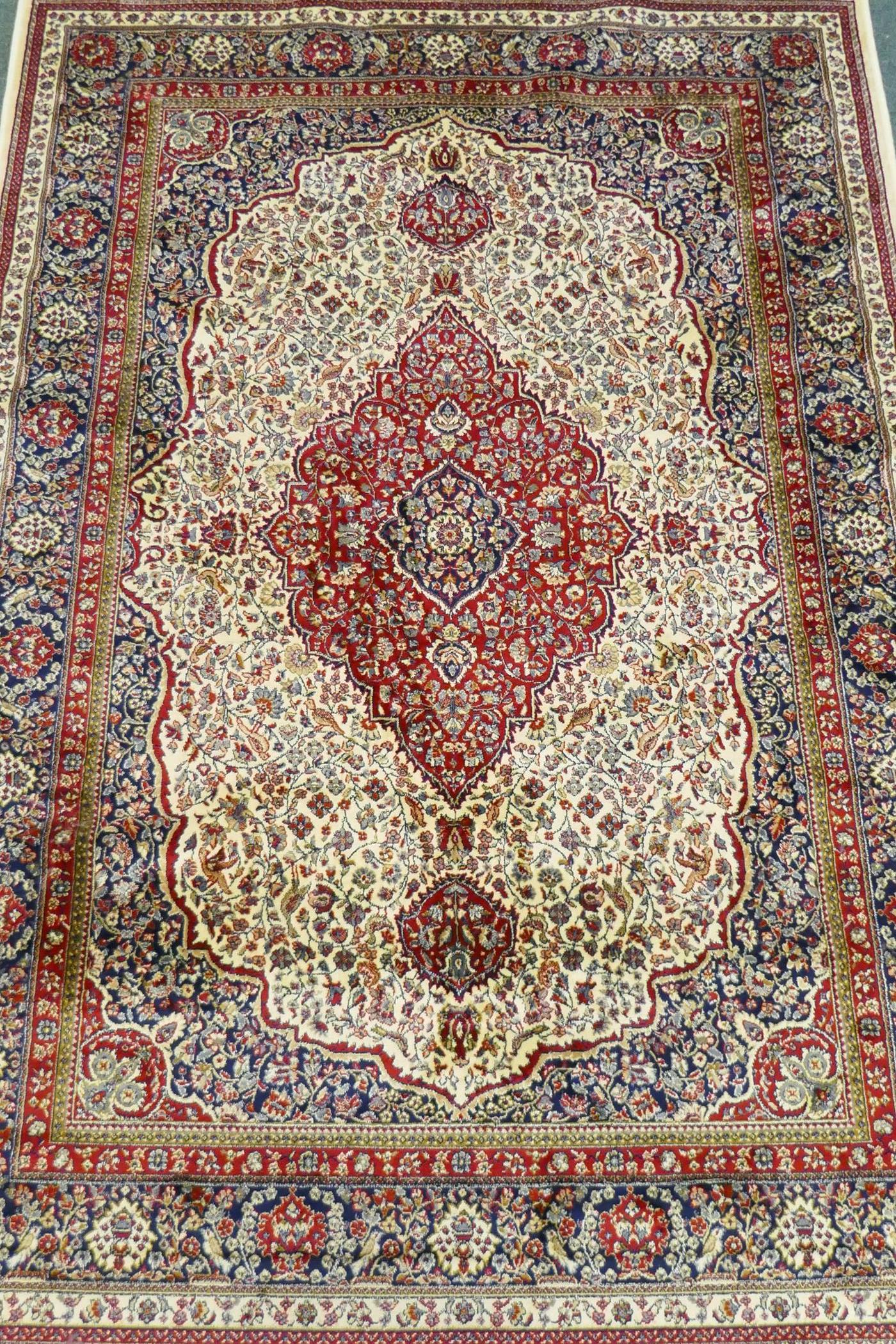 An ivory ground Kashmir carpet with central floral medallion design, 240 x 156cm - Image 4 of 5