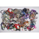 A large quantity of assorted costume jewellery including chains, necklaces, bangles, earrings etc