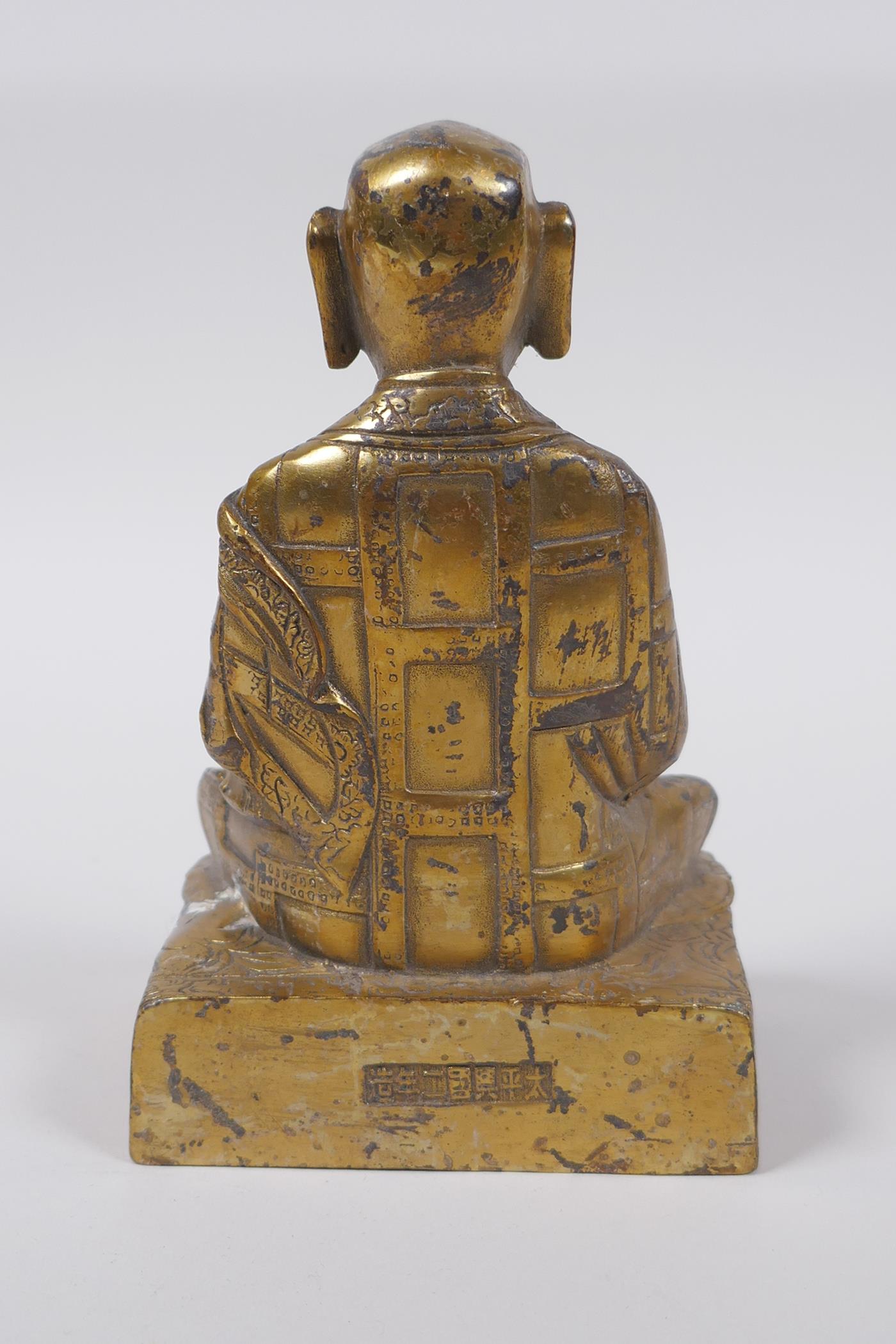 A Sino Tibetan gilt bronze figure of Buddha seated in meditation inset with semi precious stones, - Image 3 of 4
