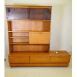 A mid century teak side cabinet and side board by Portwood Furniture Ltd, the upper section can