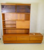 A mid century teak side cabinet and side board by Portwood Furniture Ltd, the upper section can