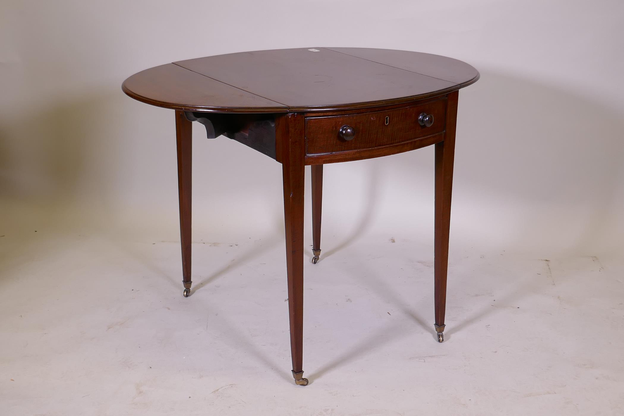 A George III mahogany Pembroke table with single drawer and bow ends, raised on square tapering - Image 4 of 7