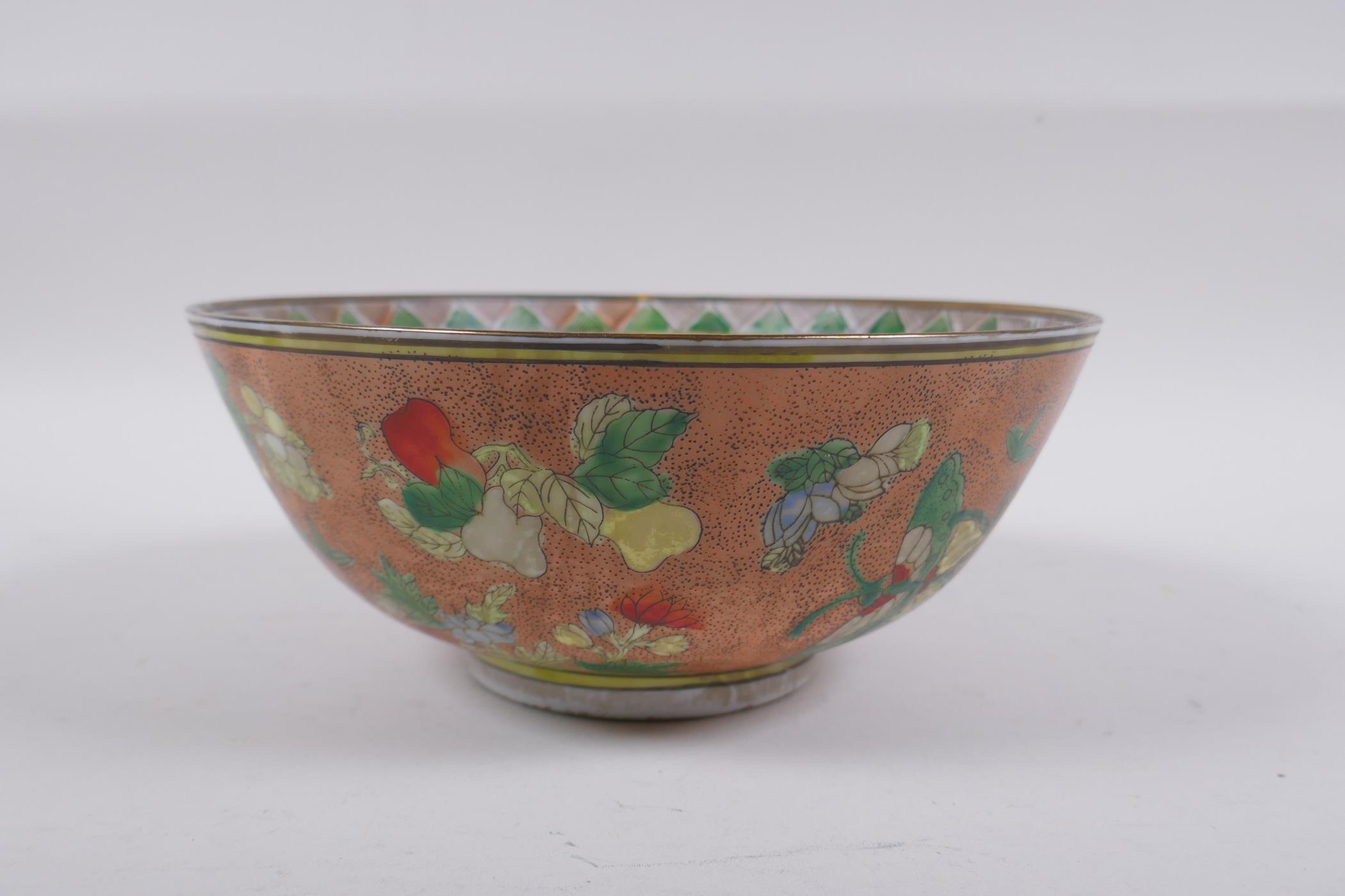 A Chinese peach ground porcelain bowl with famille verte enamel decoration of butterflies, flowers - Image 4 of 6