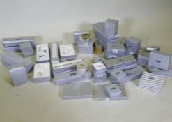 A quantity of silver plated christening gifts, piggy banks, birth certificate holders etc, approx 40