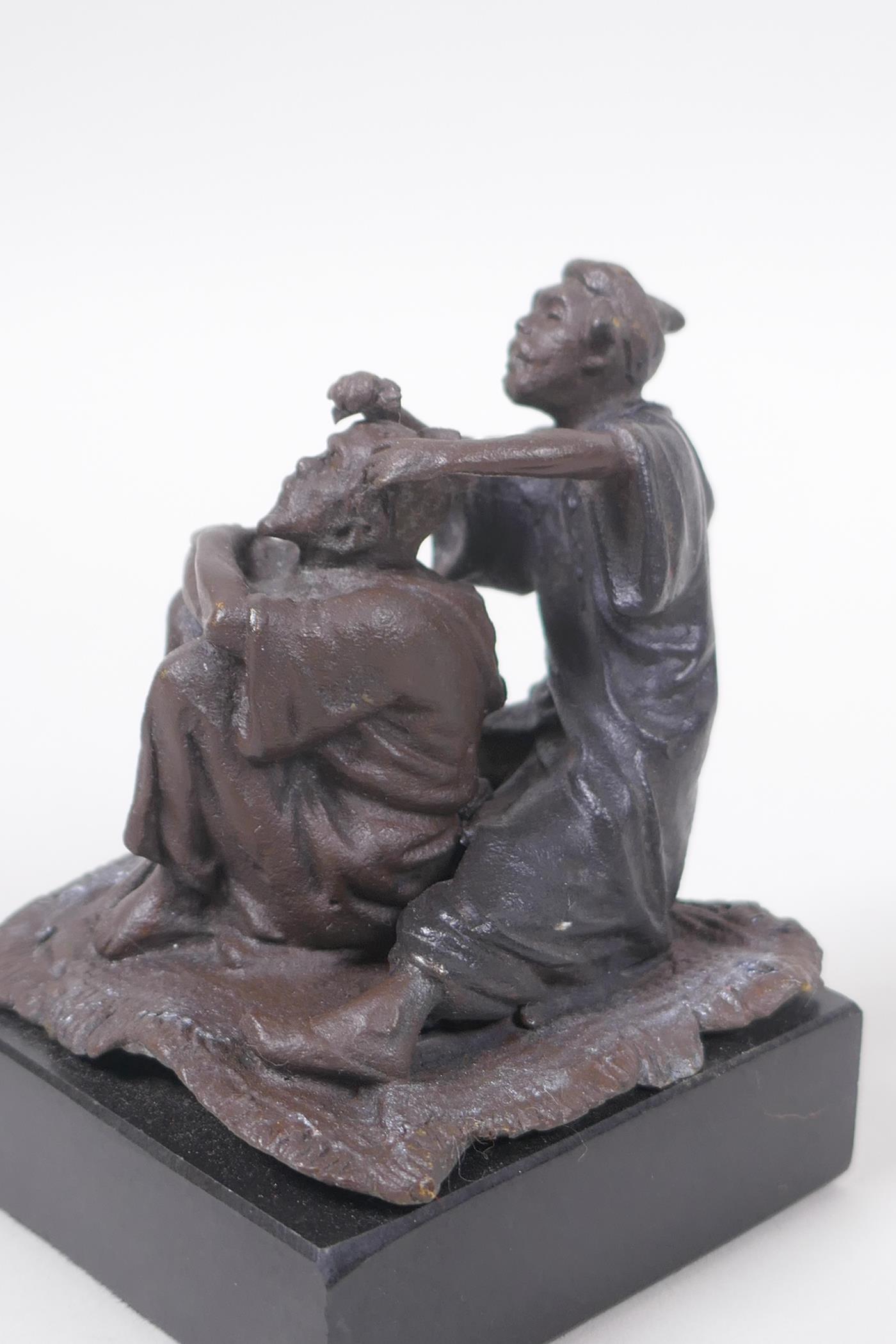 A Bergman style bronze figure of an Arab barber, 8cm high - Image 3 of 5