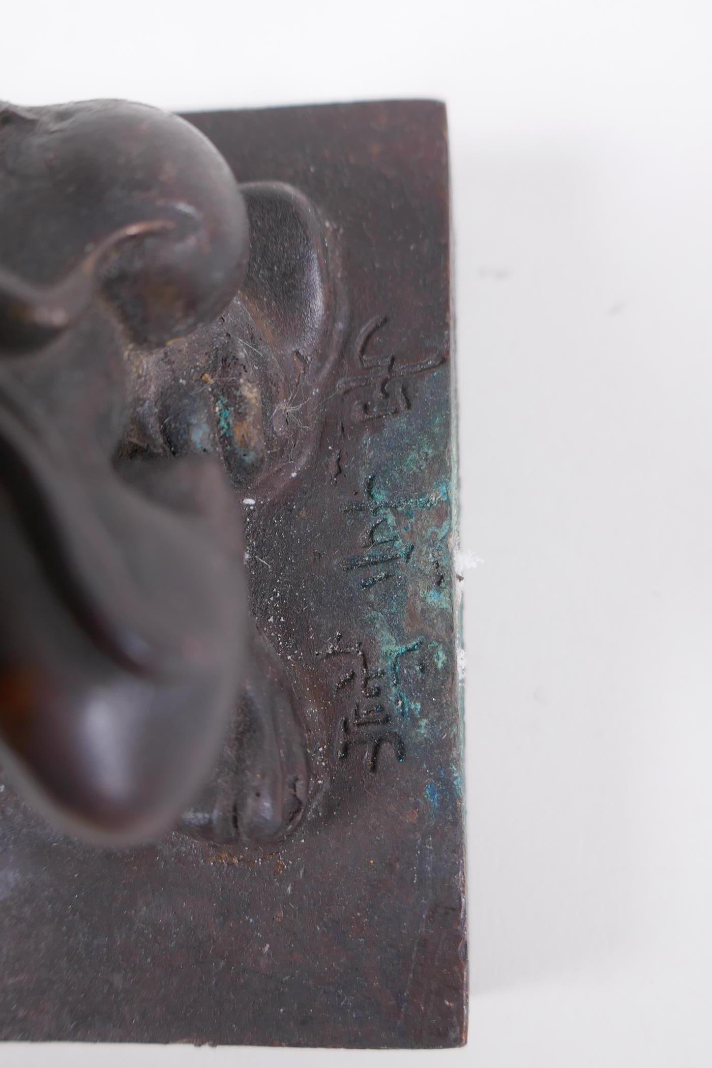 A Chinese bronze seal with a kylin knop, 9 x 9cm - Image 4 of 5