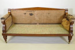 An early C19th mahogany settee in the manner of Thomas King classical style with carved