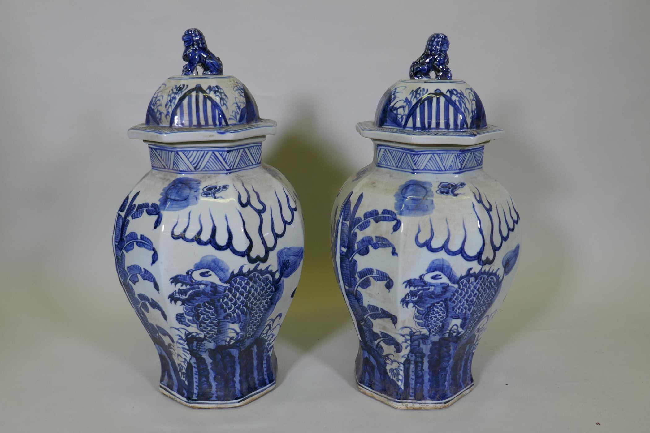 A pair of Chinese blue and white porcelain octagonal jar and covers, decorated with kylin in a - Image 3 of 6