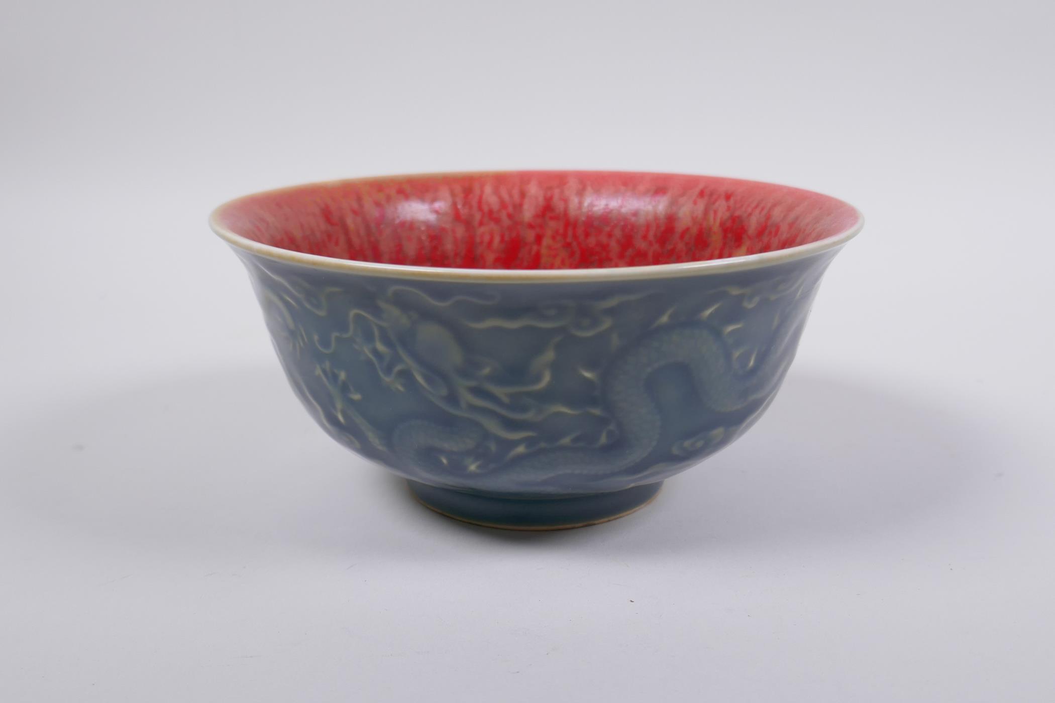 A Chinese porcelain rice bowl with a flambe glazed  interior and blue glazed exterior with - Image 3 of 5