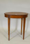 A C19th satinwood occasional table with segmented veneered oval top with laburnum crossbanding, 61 x