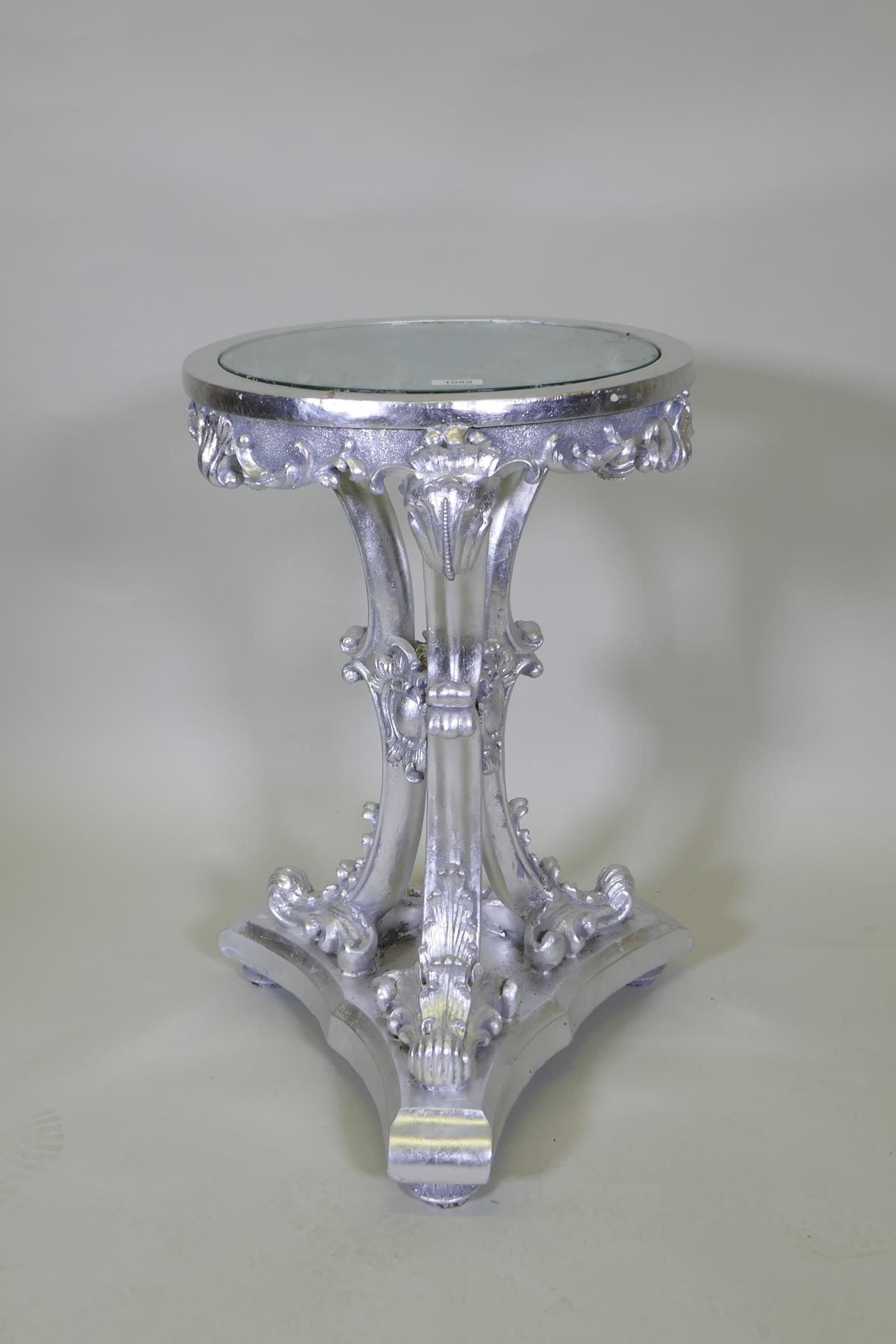 A metal leaved composition Gueridon with glass top, 44cm diameter, 69cm high