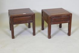 A pair of Chinese hardwood low tables each with single frieze drawer and moulded panel sides, 36 x
